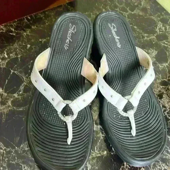 Skechers Shoes - Sketchers wedge heel black and white Women sandals .